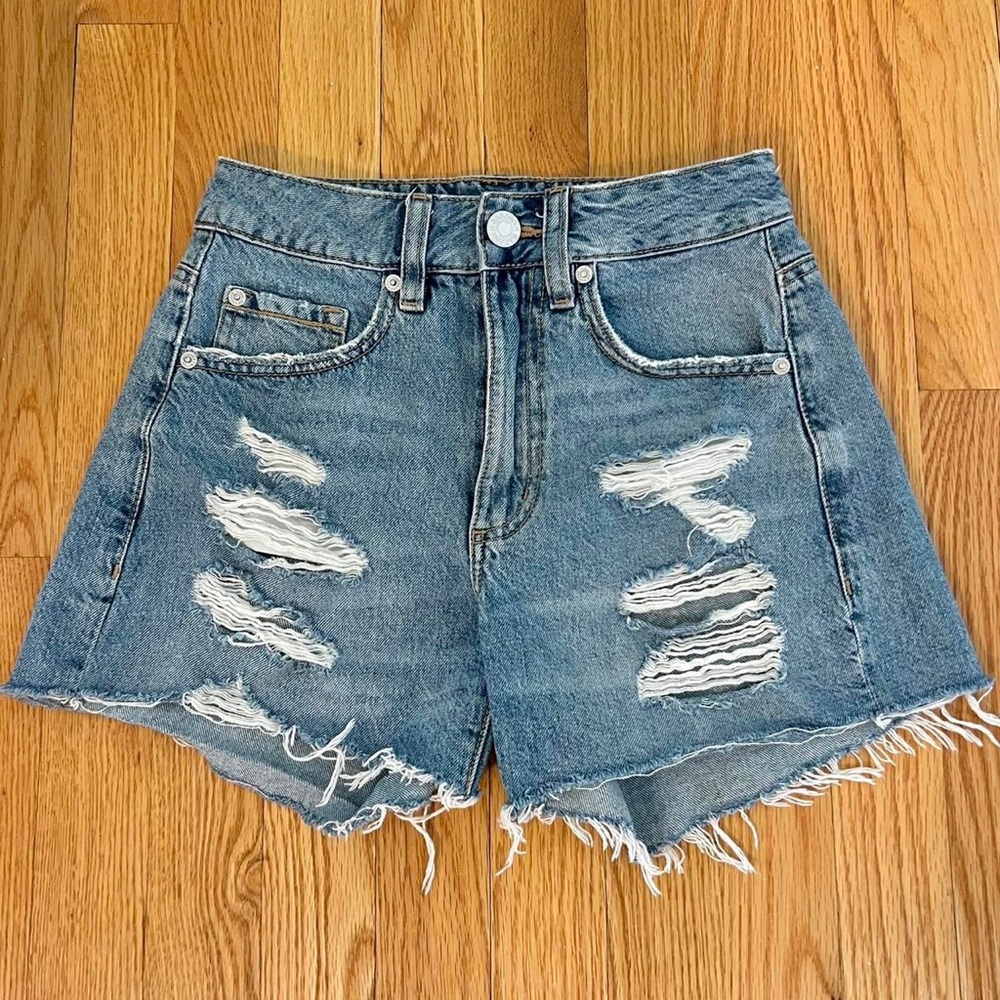 Distressed denim shorts